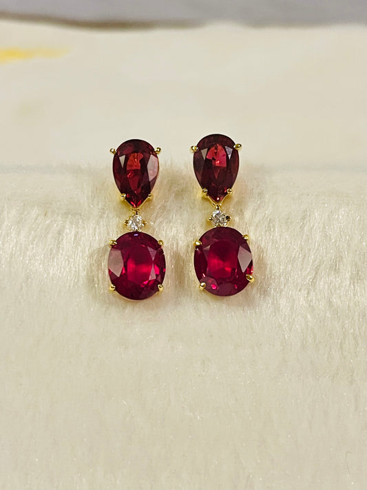 Ruby set in 14K Yellow Gold Settings