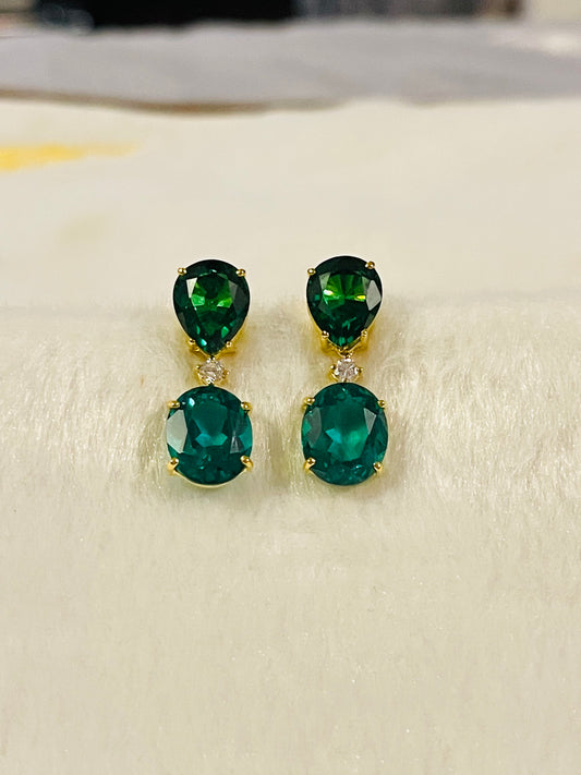 Emerald set in 14K Yellow Gold Settings
