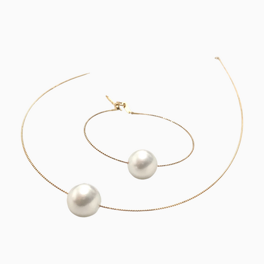 Omega 12mm South Sea Pearl Set in 18K Gold